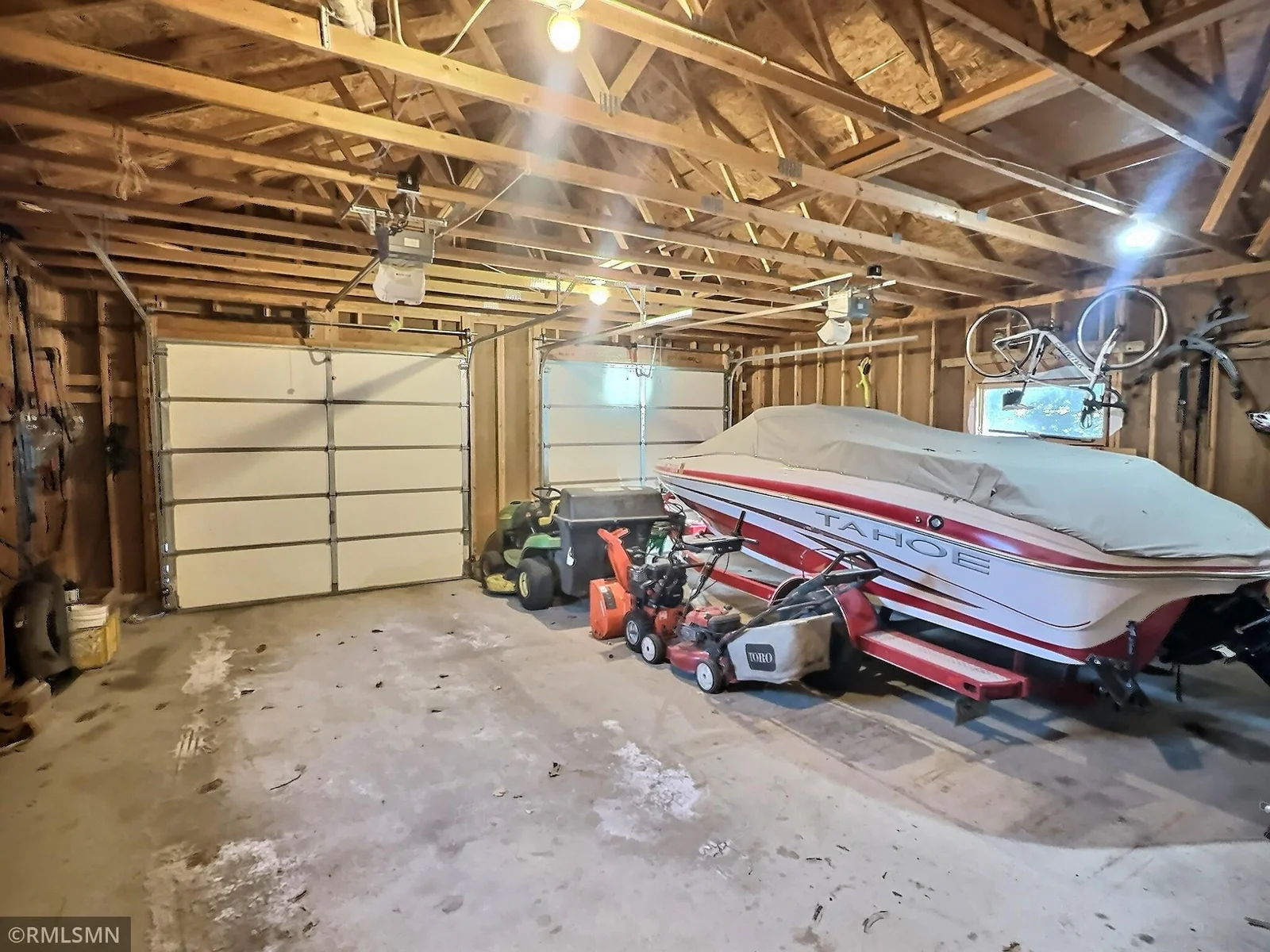 The double attached garage is ideal for all your needs. Bonus - the boat and trailer come with the purchase!