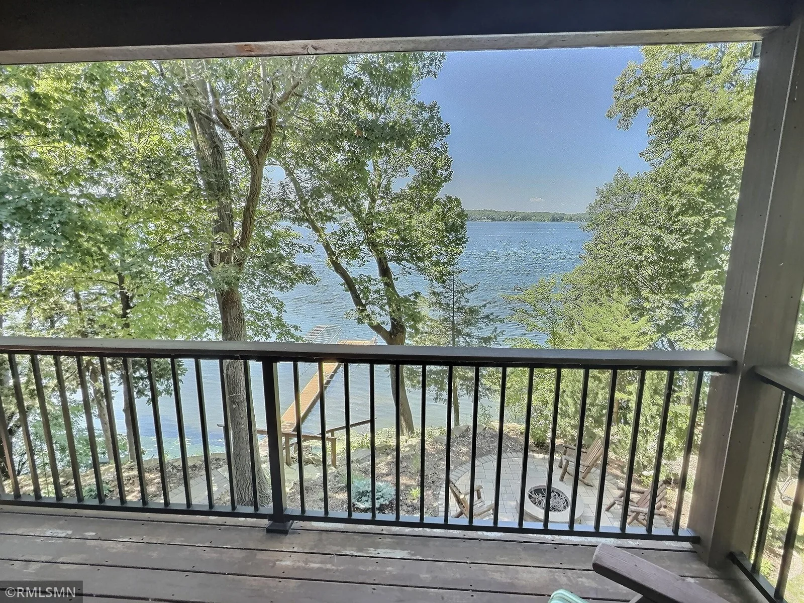 View of Cedar Lake from the primary suite, enjoy quiet morning or relaxing evenings in your own little retreat.
