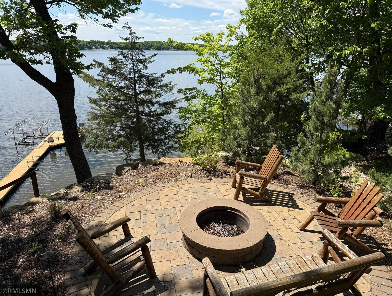 A lakeside built-in firepit will be your favorite spot to enjoy the Minnesota evenings.