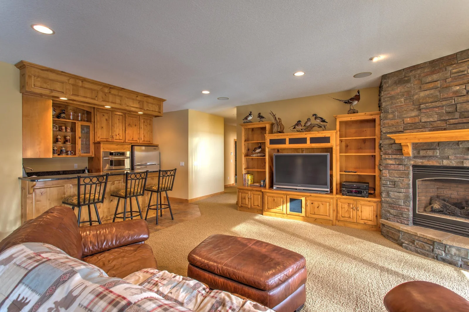 Cozy family room with built-ins and bar top