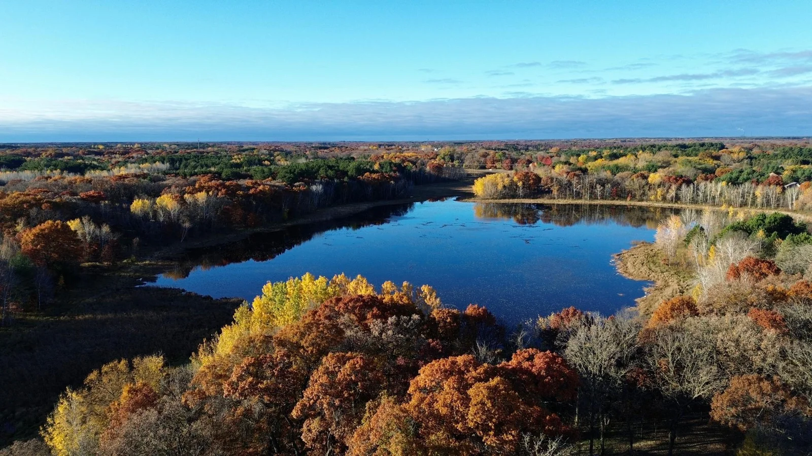 200+ feet of shoreline on this approximately 15+ acre private lake