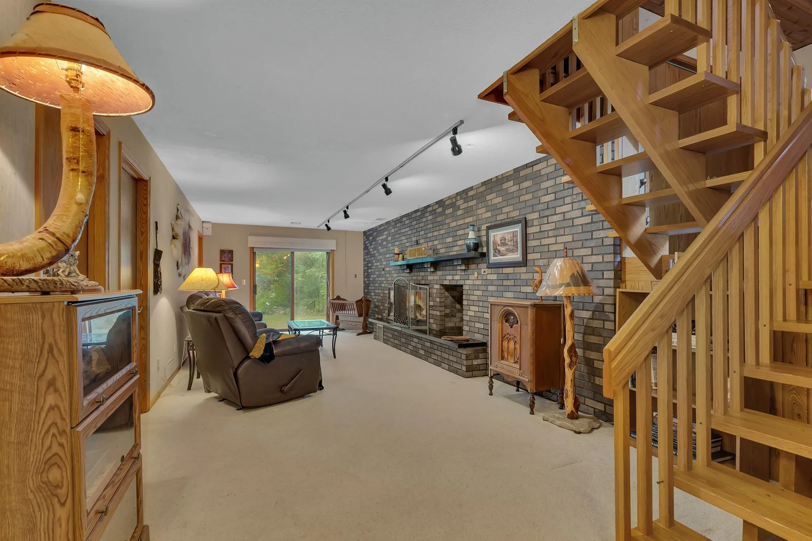 The lower family room walks out the rear yard