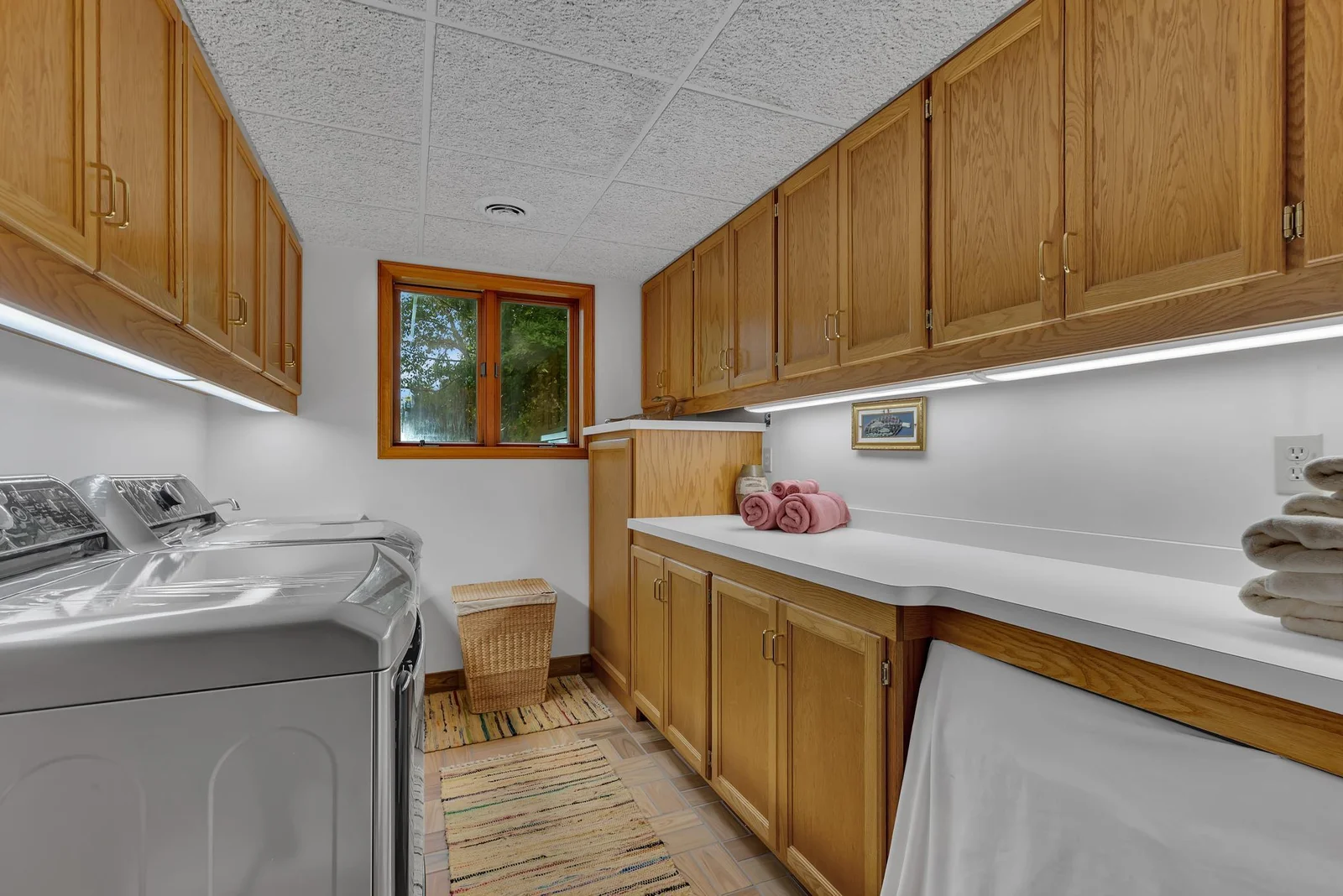 Tons of space for all your laundry needs in this nicely laid out laundry room