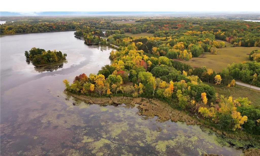 A secluded 15+ Acre paradise just minutes to an easy commute via I94