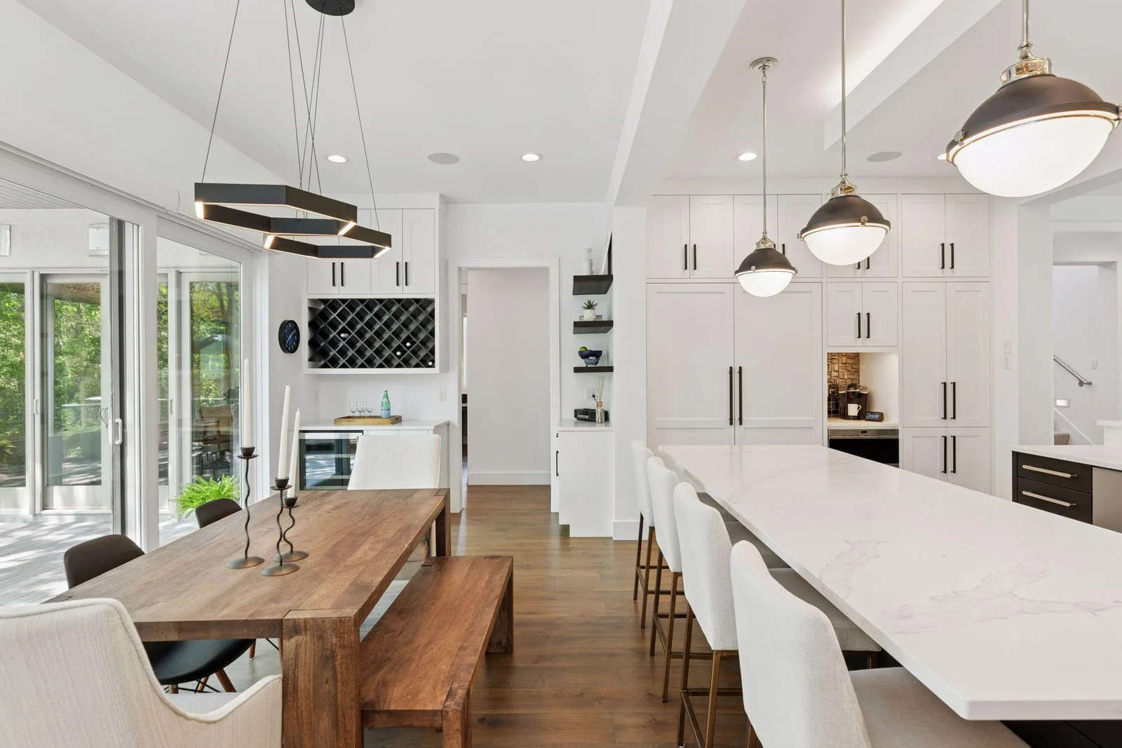 Dining area with island seating and bar w/wine cooler