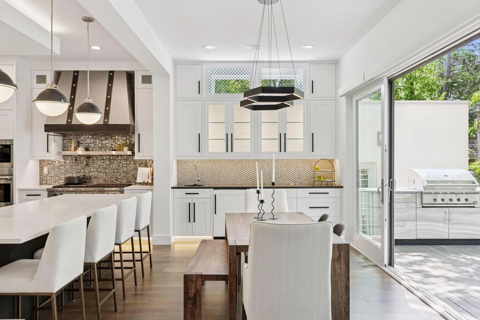 Dining area with large wet-bar and open to back deck