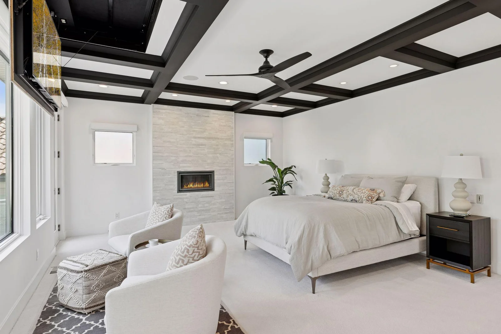 Primary suite with sitting area and gas fireplace
