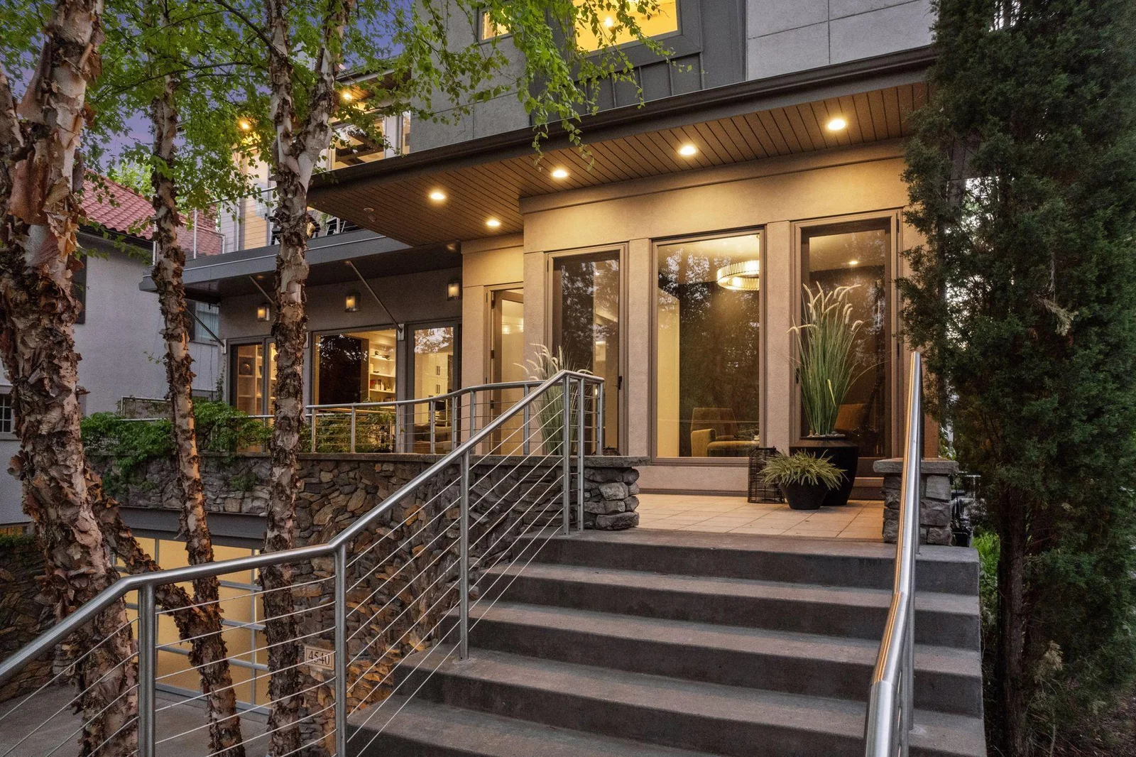 Beautiful custom hardscaping creates welcoming entrance