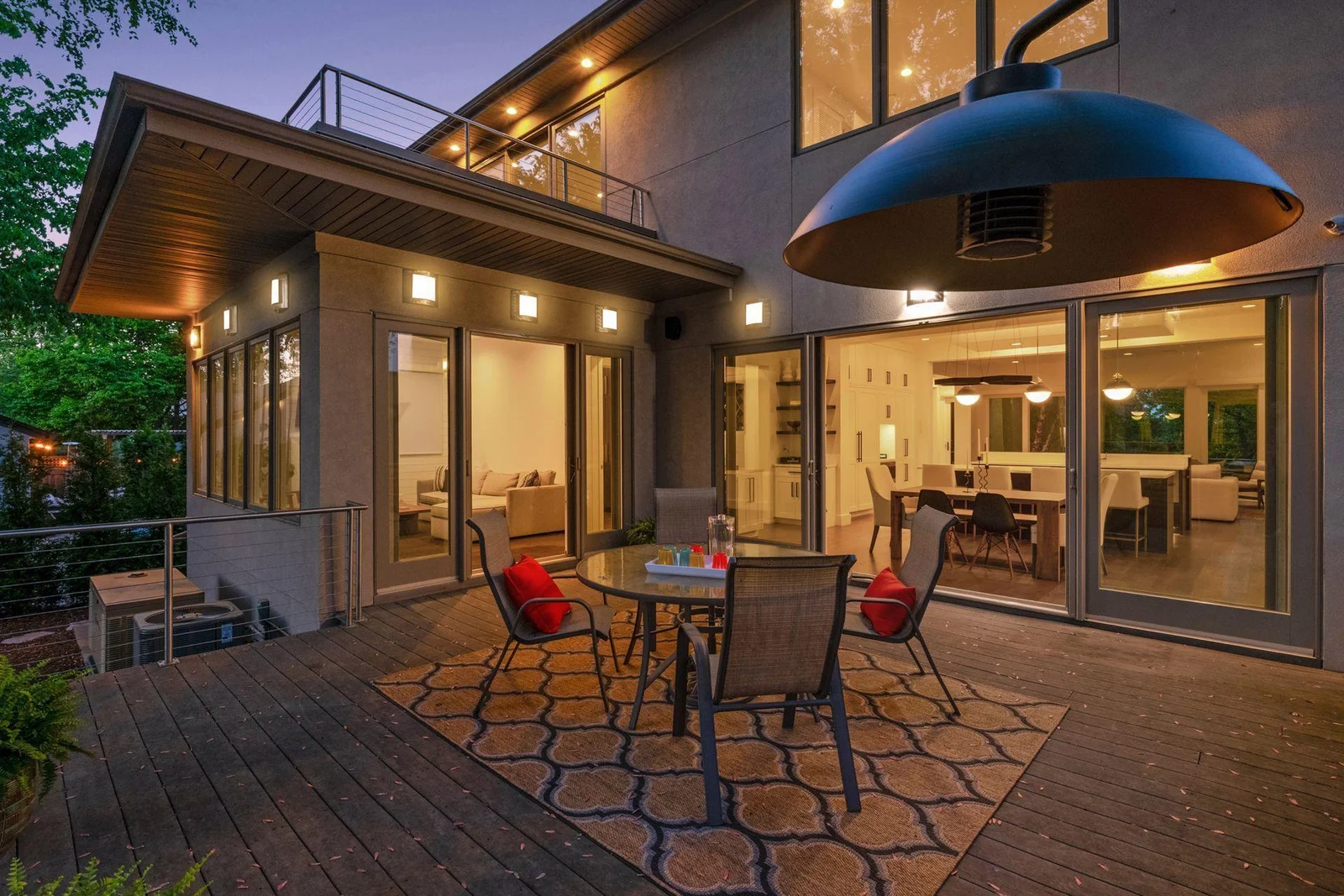 Private back deck off of kitchen & sunroom