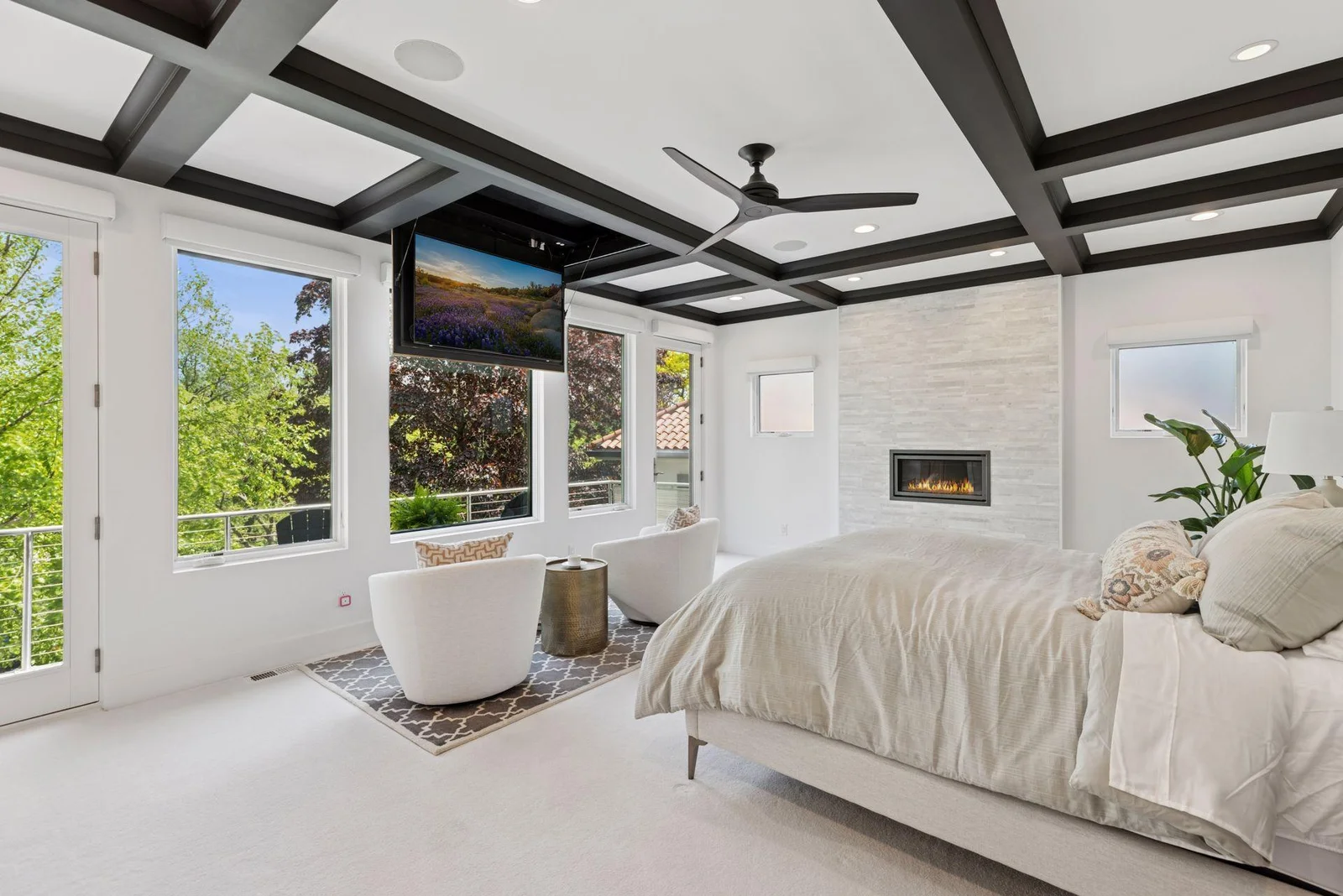 Primary suite with integrated drop-down television