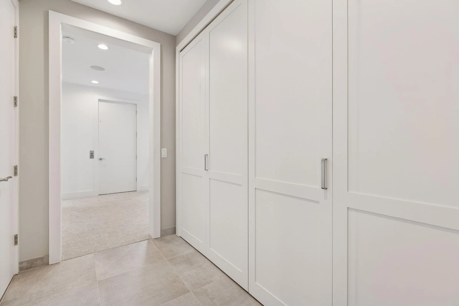 Upper level laundry room with custom doors