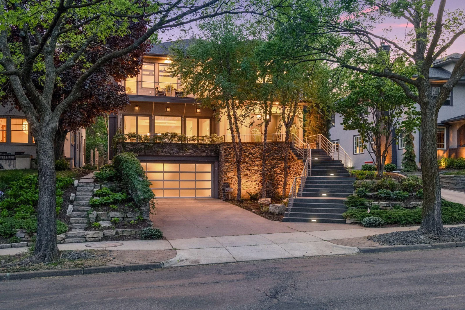 Custom lighting and low maintenance landscaping