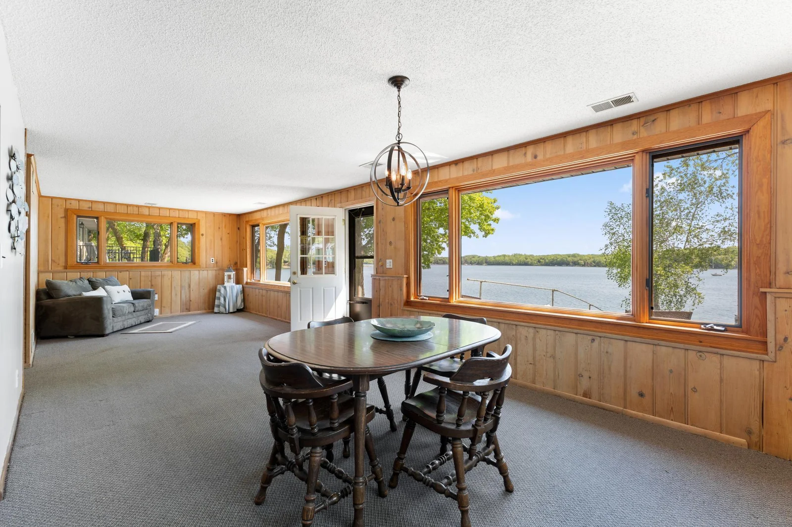 Living room walks out to the lakeside patio
