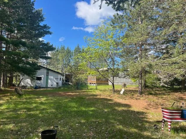 Older garage next to mobile home