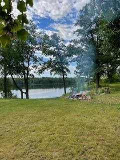 Yard with lakeview
