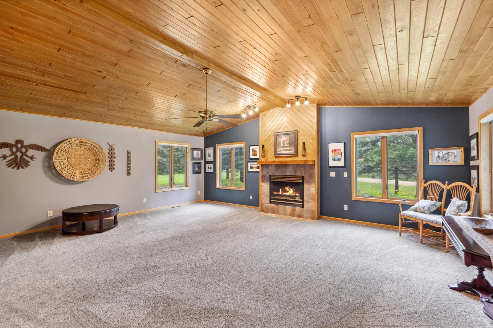 Huge main level living room addition includes a gad fireplace.