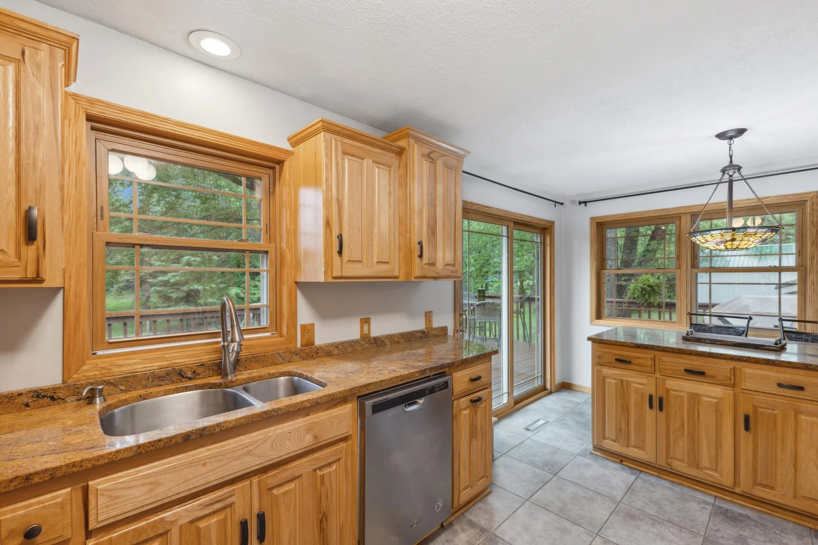 Stainless steel appliances and granite counter tops.