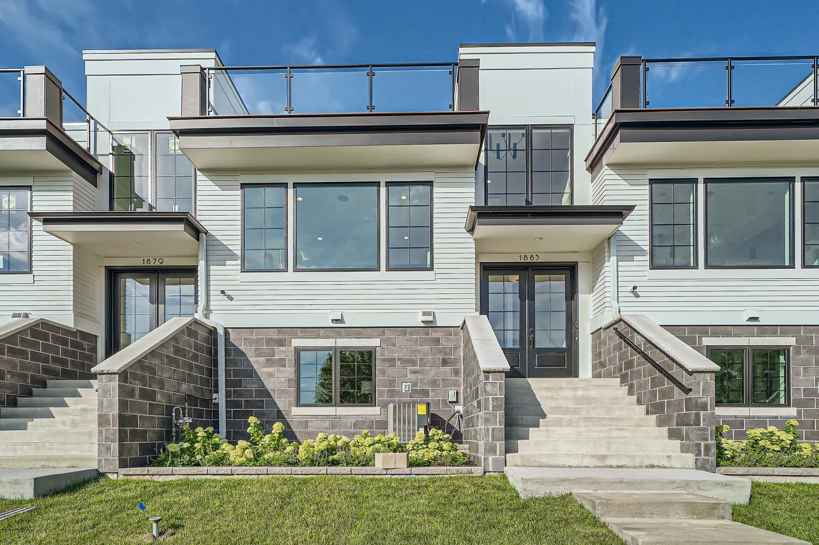 Elegant front entry overlooking views of Long Lake!