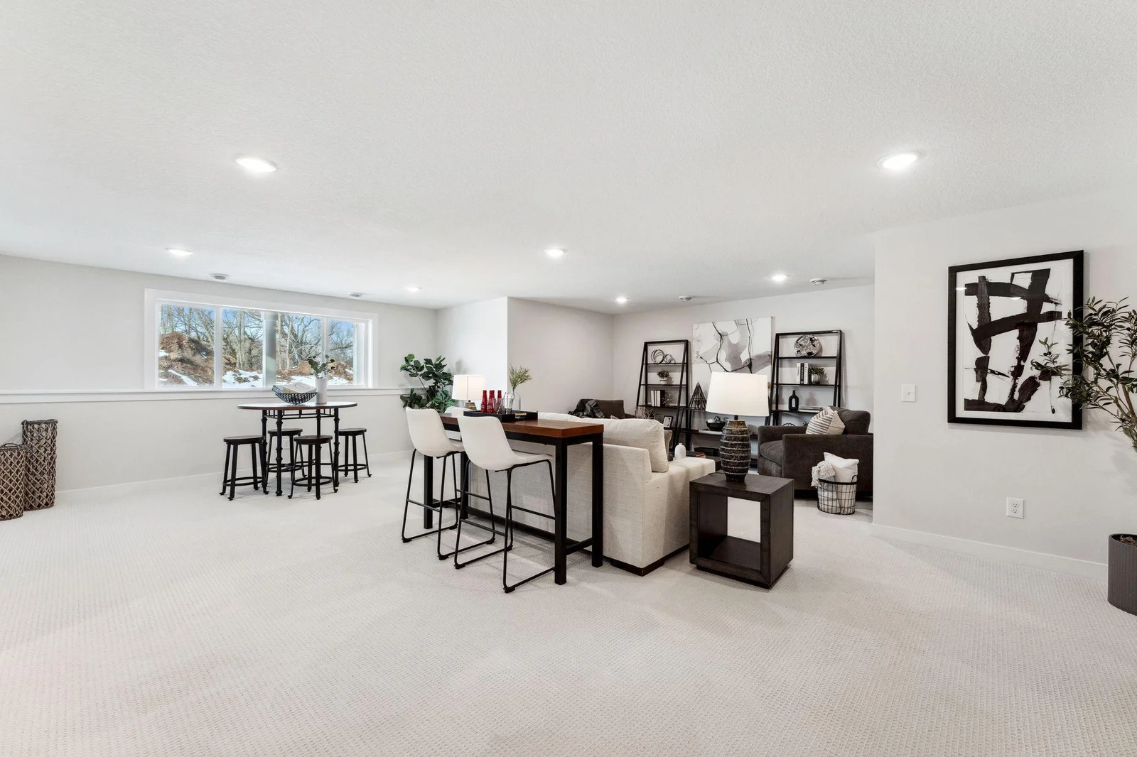 Large finished lower level space with Look-out windows