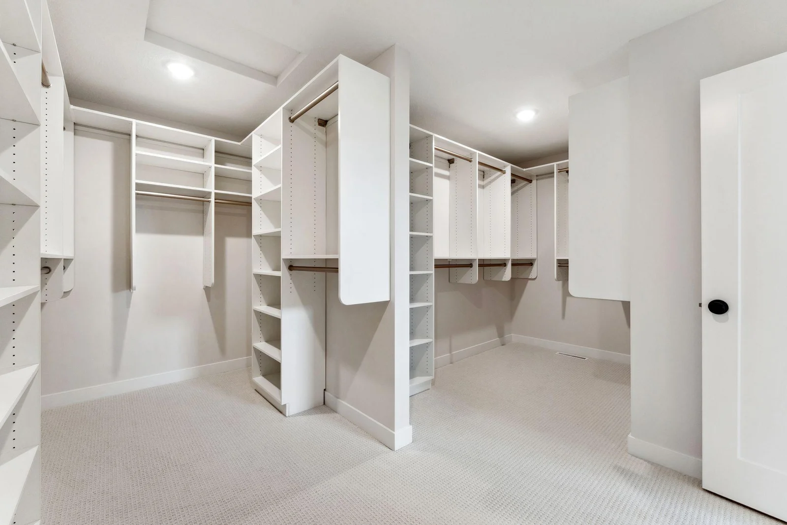 Owner's suite INCREDIBLE walk-in closet with built in shelving