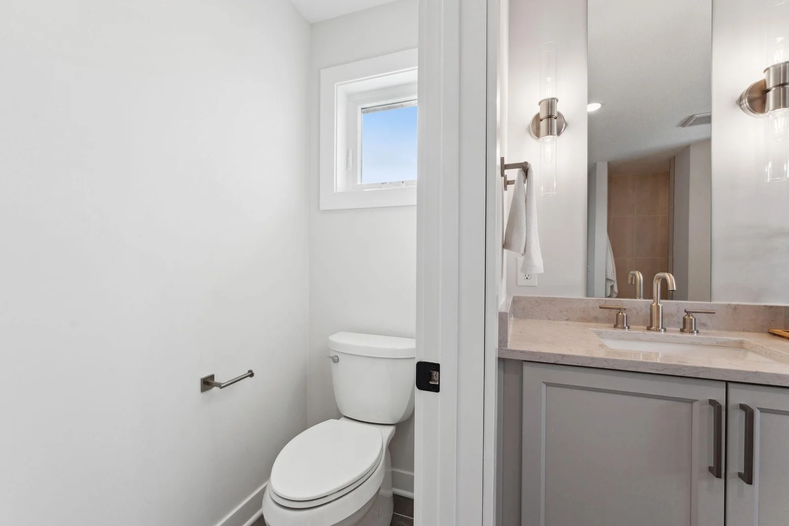 Separate toilet with privacy door in Owner's Suite