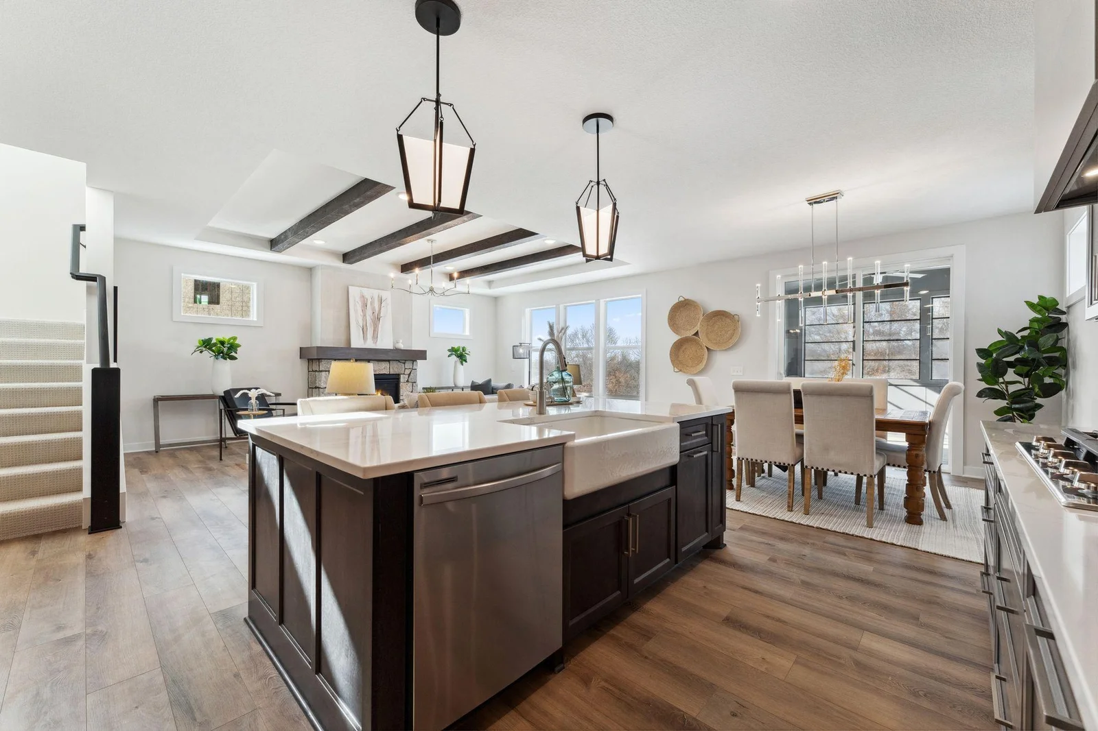 Kitchen with oversized island and farmhouse deep sink