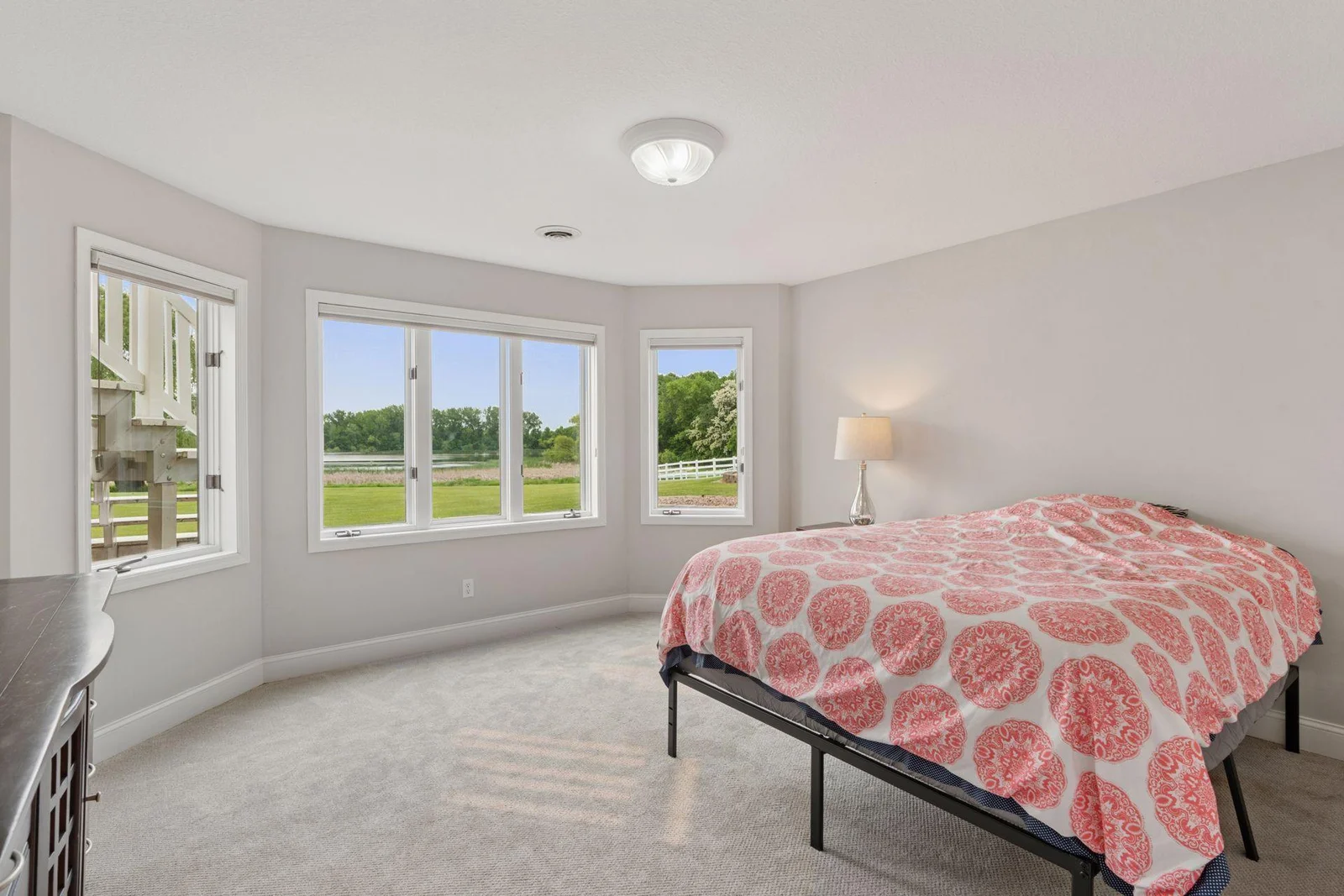 Lower Level Bedroom with views of backyard