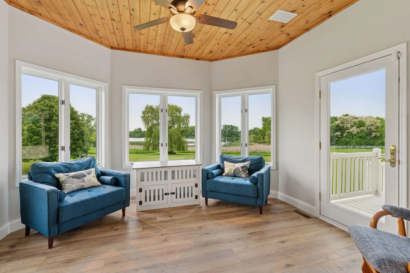 Sun-room with walk out to Maintenance Free Deck