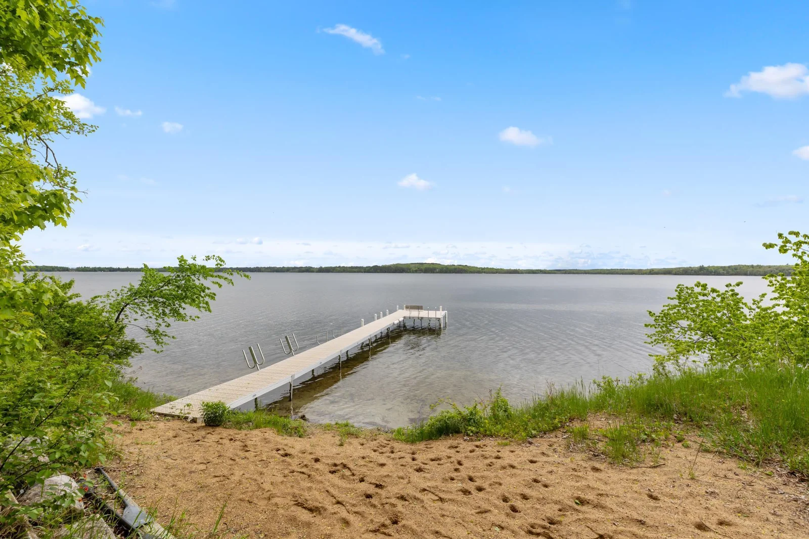 sandy beach with newer dock included
