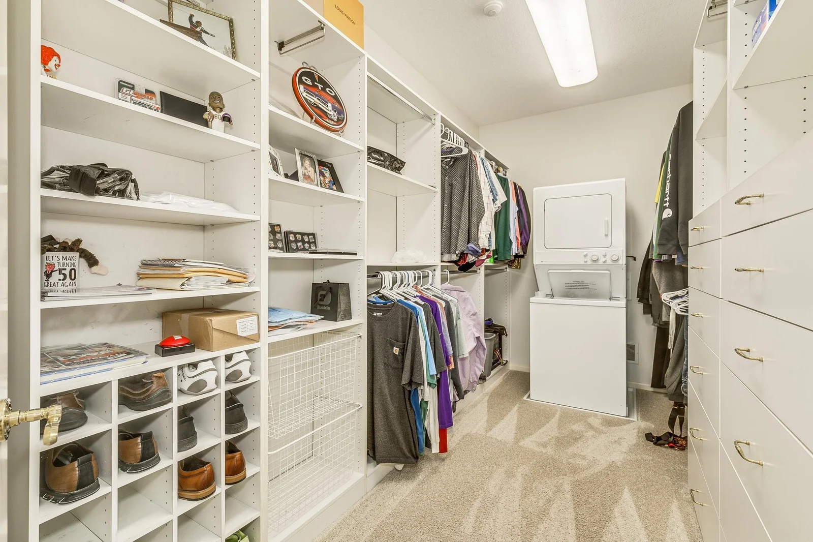 Primary Walk-In Closet With Laundry