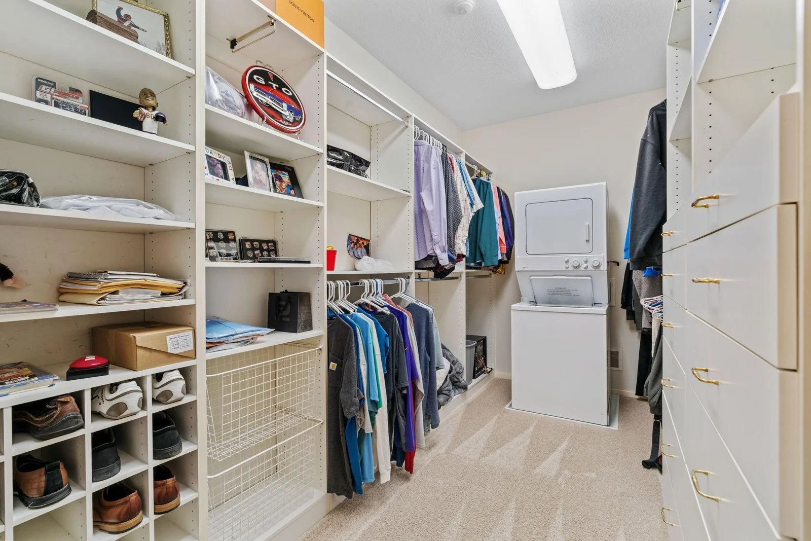 His & Hers Walk In Closets With Washer/Dryer