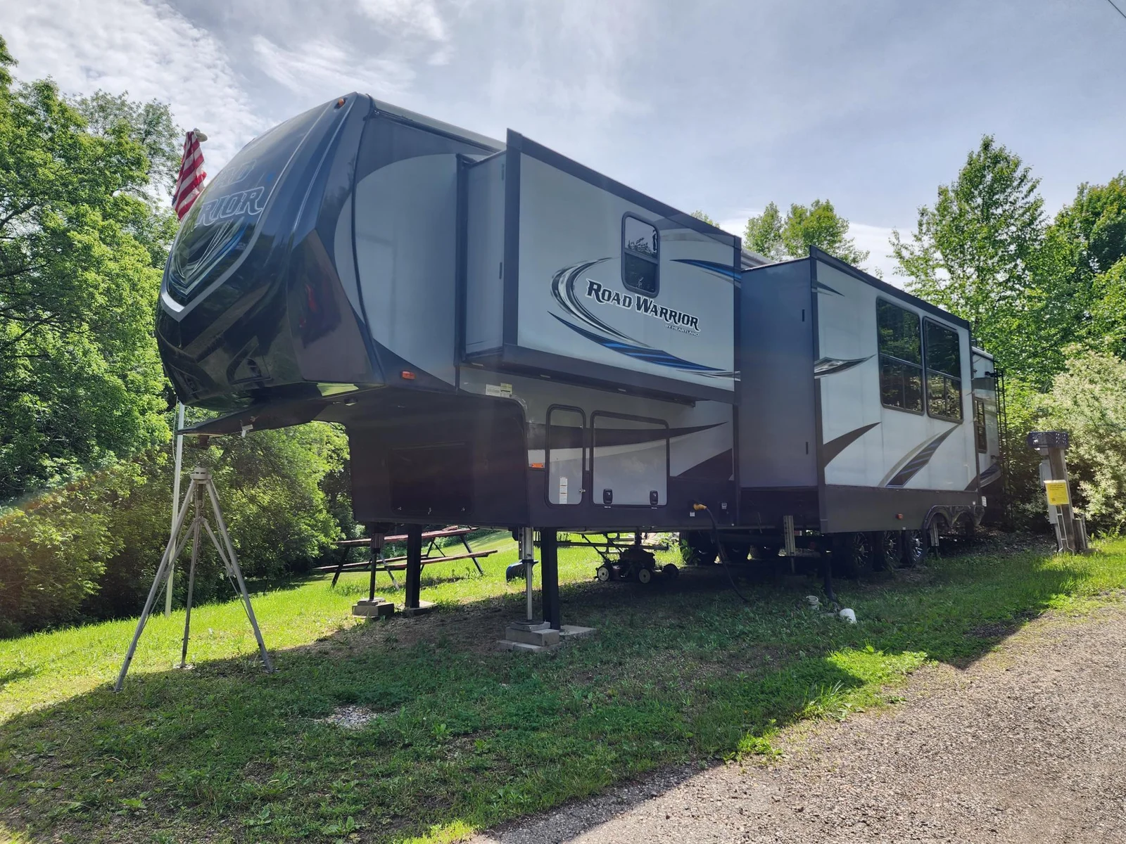 2017 427RW Road Warrior on private hillside unit at Cokato Lake RV Resort.  Tons of value!