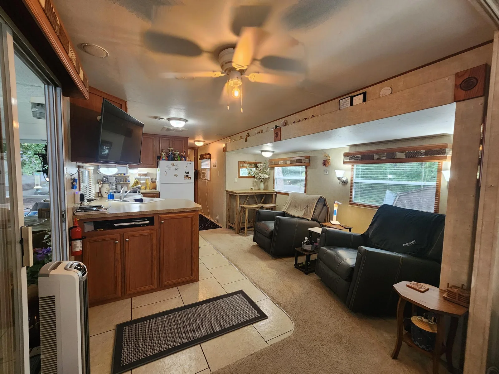 Unit 109 Cokato Lake RV Resort Cooperative has a 2010 Breckenridge Destination RV and Quality-built Sun Room; ample parking, shed, outstanding landscaping and many other shared amenities including a 550 acre 50+ foot lake!
