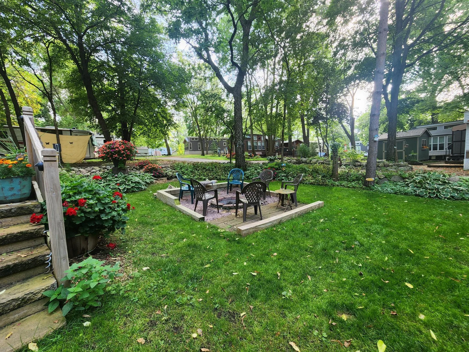 Unit 109 Cokato Lake RV Resort Cooperative has a 2010 Breckenridge Destination RV and Quality-built Sun Room; ample parking, shed, outstanding landscaping and many other shared amenities including a 550 acre 50+ foot lake!