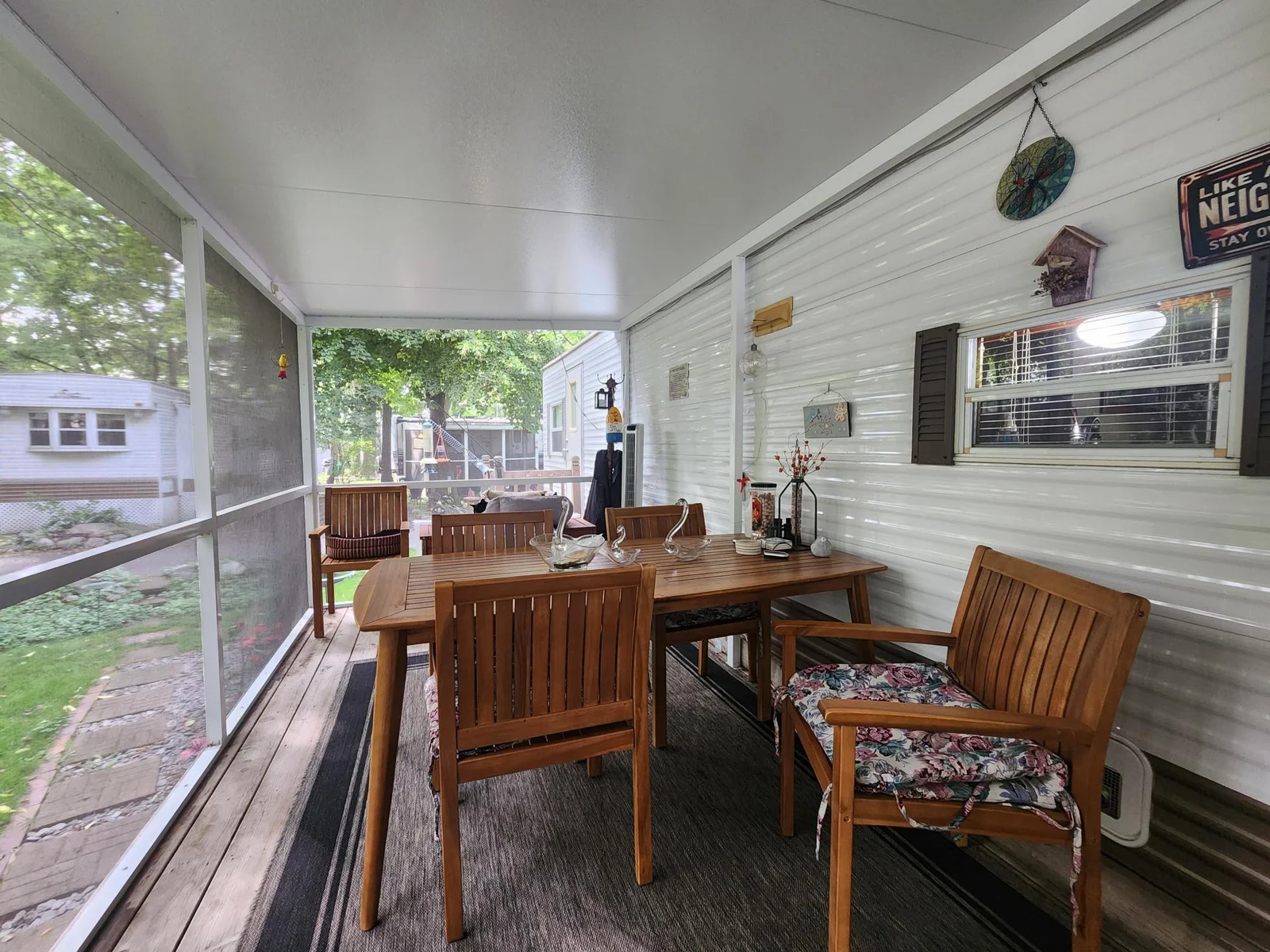 Unit 109 Cokato Lake RV Resort Cooperative has a 2010 Breckenridge Destination RV and Quality-built Sun Room; ample parking, shed, outstanding landscaping and many other shared amenities including a 550 acre 50+ foot lake!