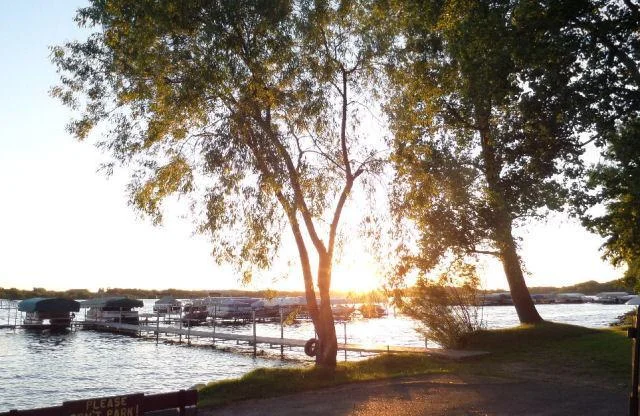 Cokato Lake is 550+ acres of fun in the sun!  Over 50 feet deep, a sand bar, a sunken island... Drop a line and catch a good one! Bass, Northern, Huge Crappies, Walleye and more. Fish from the docks, or rent a slip (for your boat and lift).  Act NOW!