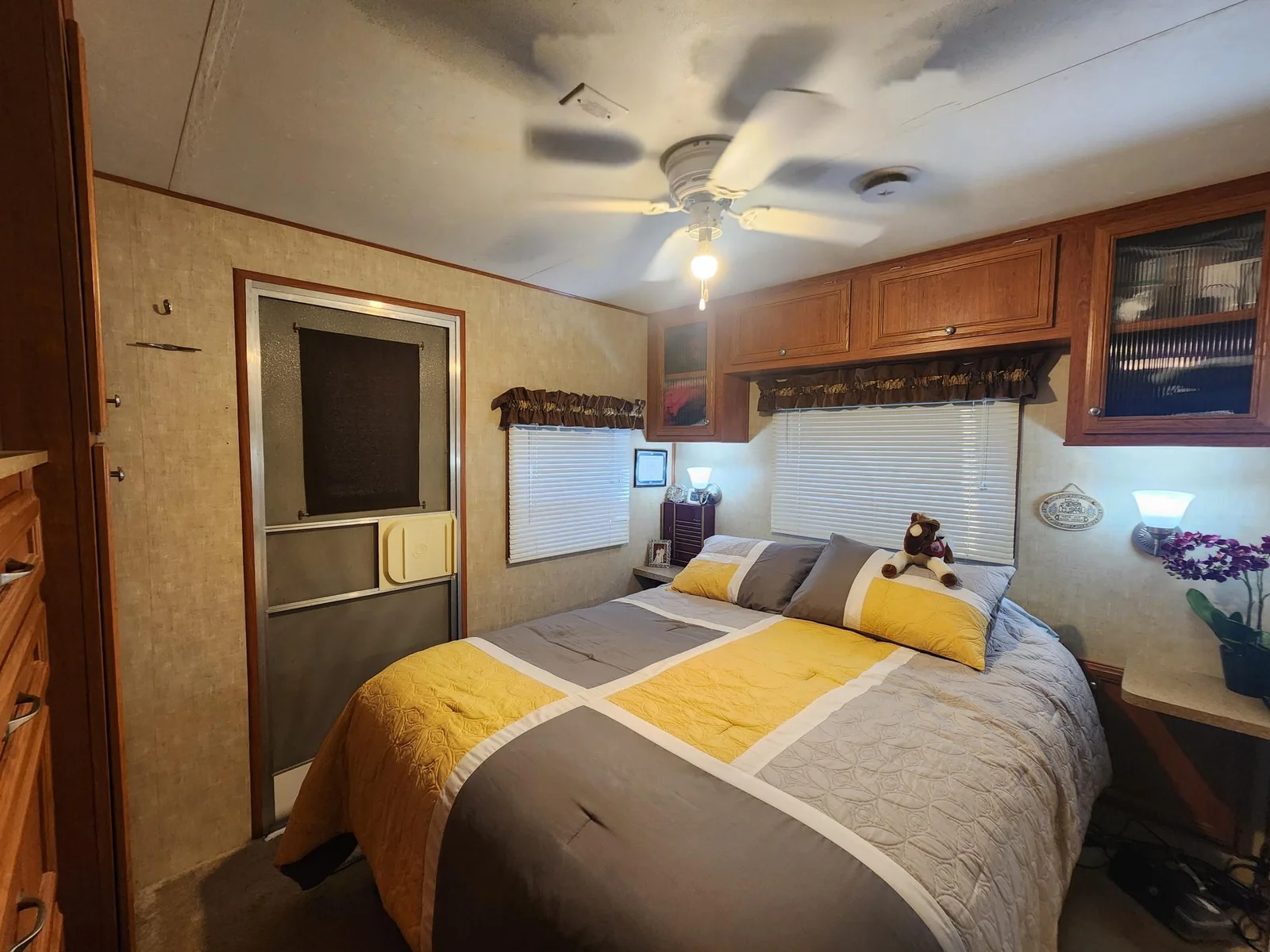 Unit 109 Cokato Lake RV Resort Cooperative has a 2010 Breckenridge Destination RV and Quality-built Sun Room; ample parking, shed, outstanding landscaping and many other shared amenities including a 550 acre 50+ foot lake!