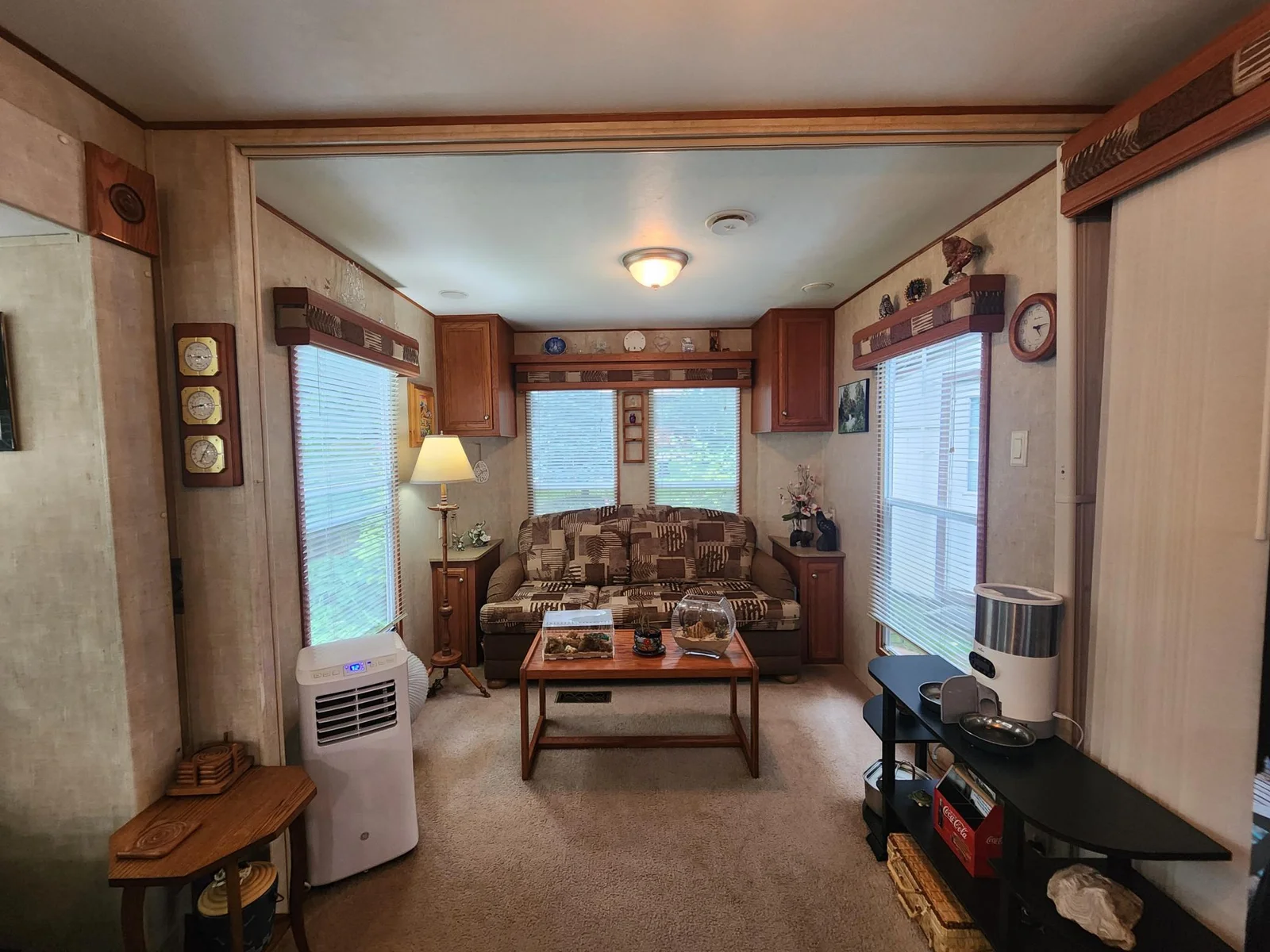 Unit 109 Cokato Lake RV Resort Cooperative has a 2010 Breckenridge Destination RV and Quality-built Sun Room; ample parking, shed, outstanding landscaping and many other shared amenities including a 550 acre 50+ foot lake!