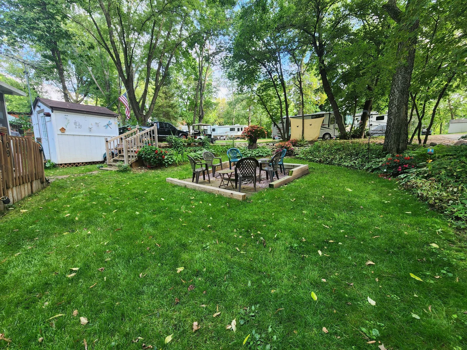 Unit 109 Cokato Lake RV Resort Cooperative has a 2010 Breckenridge Destination RV and Quality-built Sun Room; ample parking, shed, outstanding landscaping and many other shared amenities including a 550 acre 50+ foot lake!