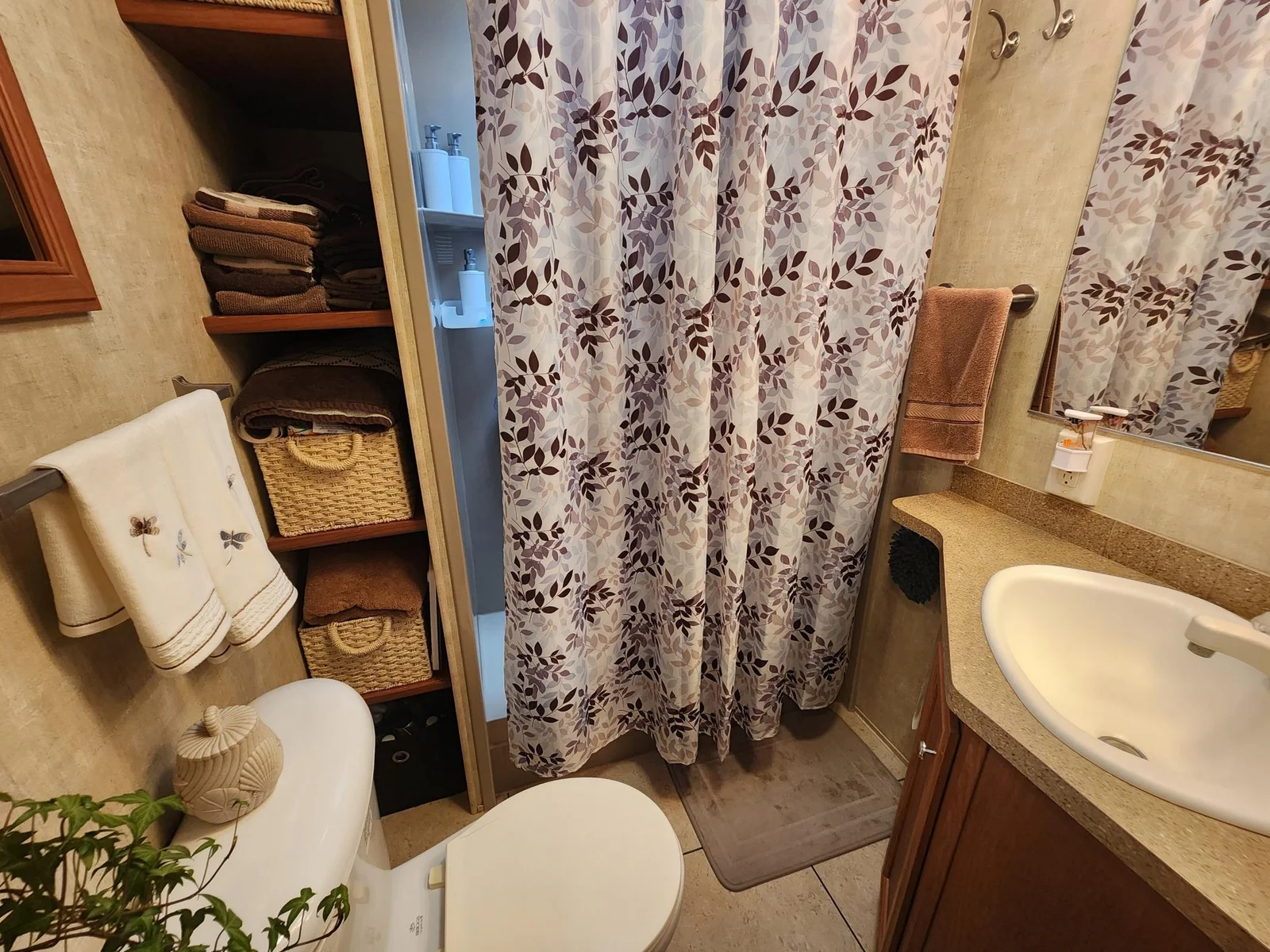 Unit 109 Cokato Lake RV Resort Cooperative has a 2010 Breckenridge Destination RV and Quality-built Sun Room; ample parking, shed, outstanding landscaping and many other shared amenities including a 550 acre 50+ foot lake!