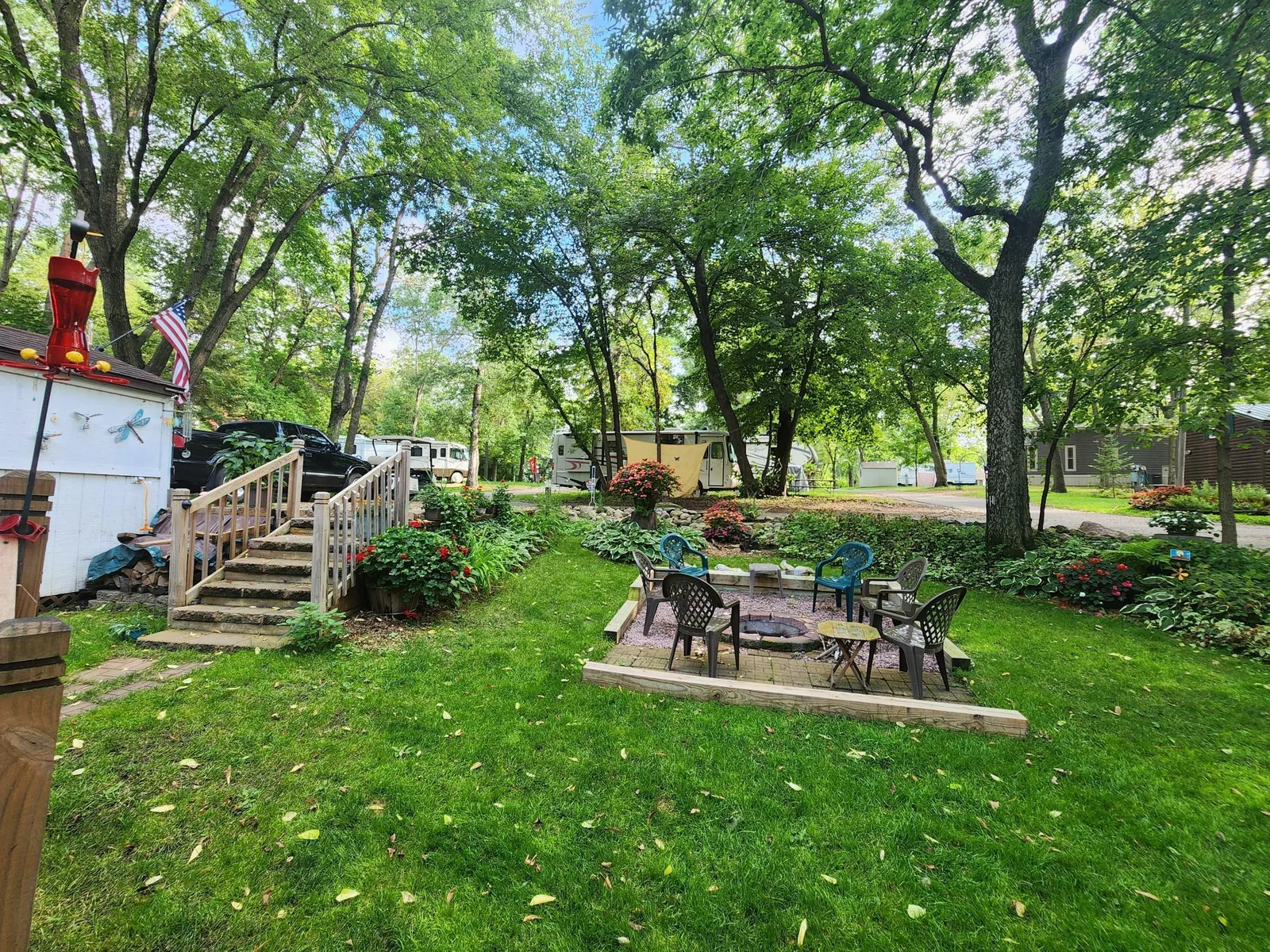 Unit 109 Cokato Lake RV Resort Cooperative has a 2010 Breckenridge Destination RV and Quality-built Sun Room; ample parking, shed, outstanding landscaping and many other shared amenities including a 550 acre 50+ foot lake!