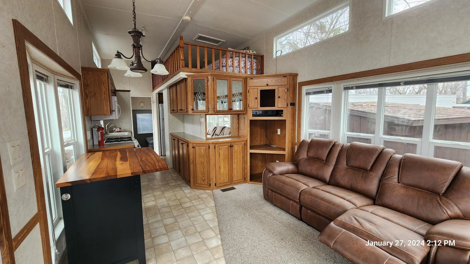 Cokato Lake RV Resort Unit 118 Lofted Park Model, Deck, Shed with peek-a-boo view of Cokato Lake