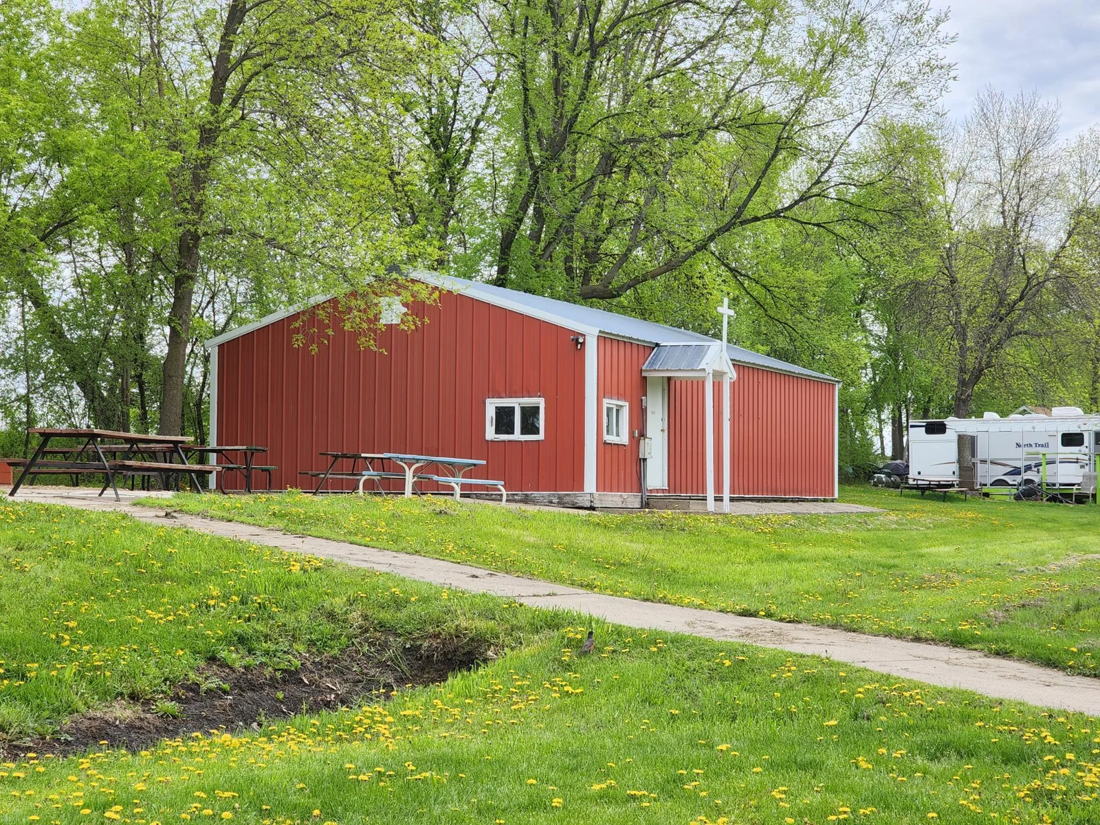 Cokato Lake RV Resort Unit 118 Lofted Park Model, Deck, Shed with peek-a-boo view of Cokato Lake
