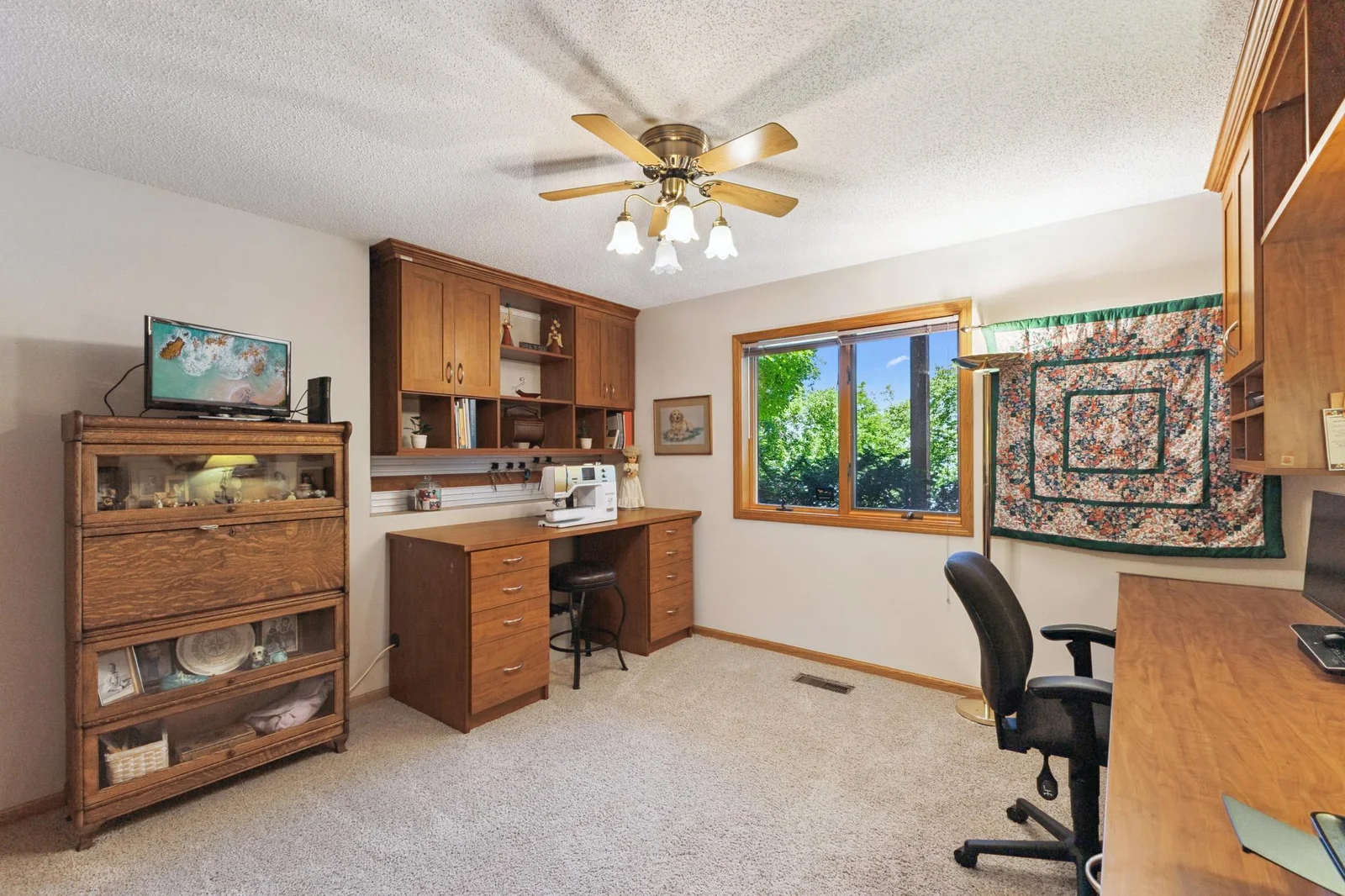 This bedroom was used as a craft room. Another large room.