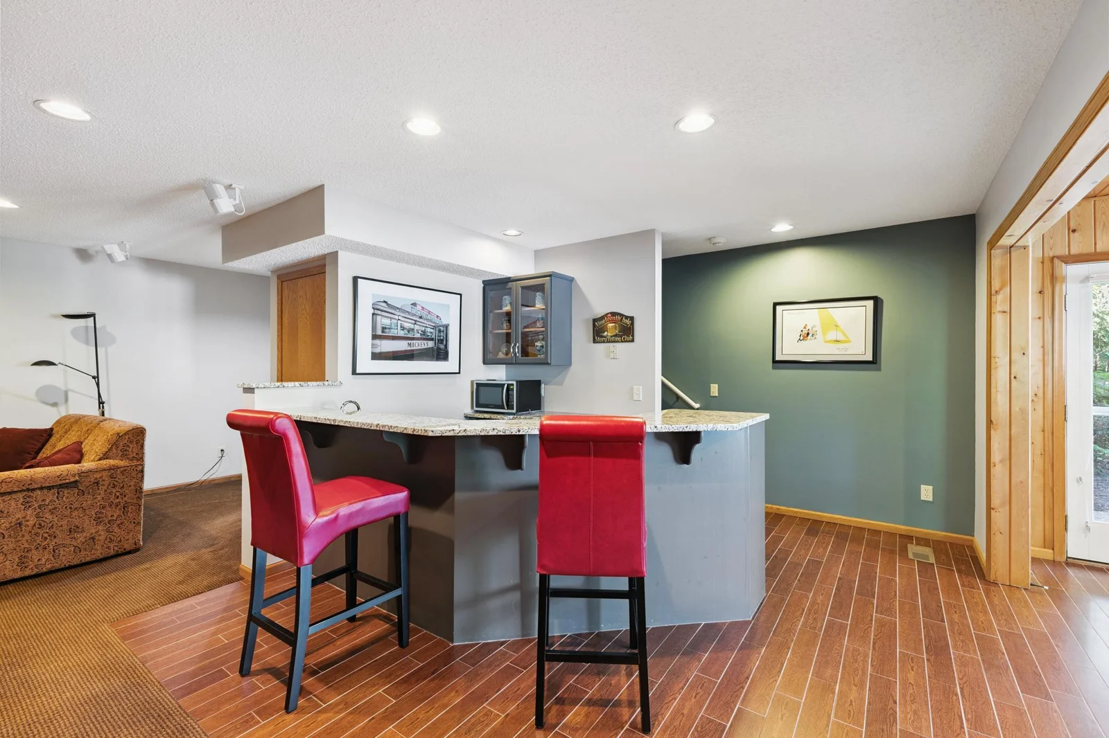 Lower level features this great wet-bar entertainment area.