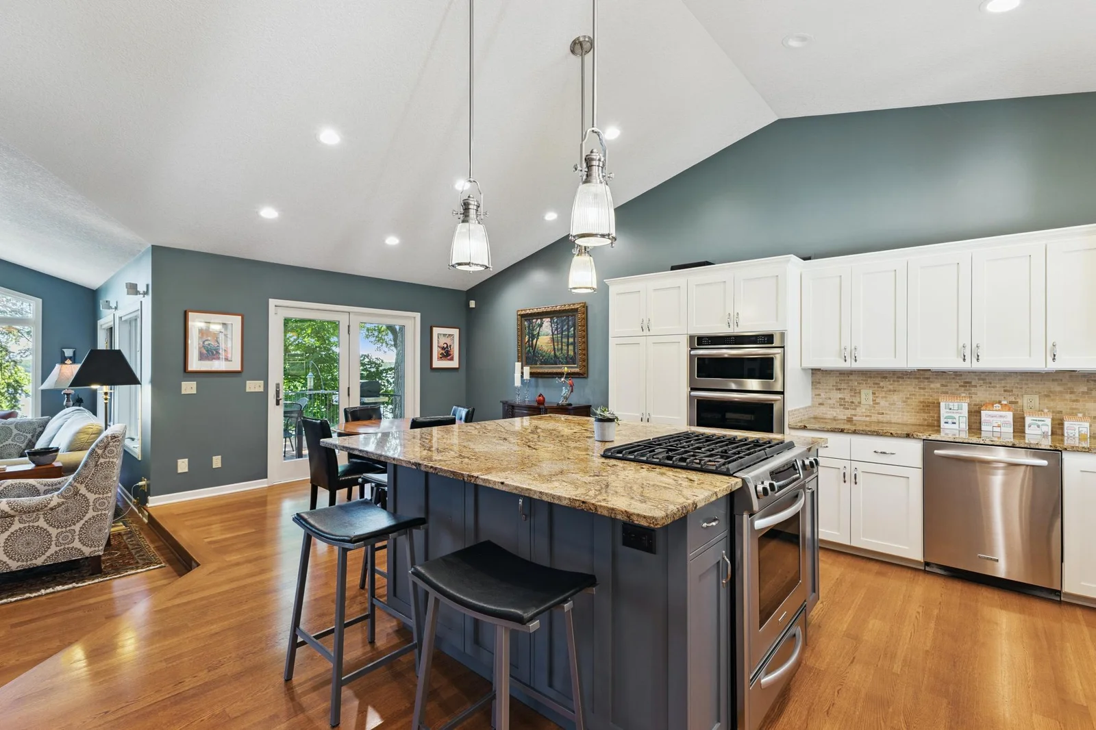Backsplash, pull-out shelving, custom cabinets.