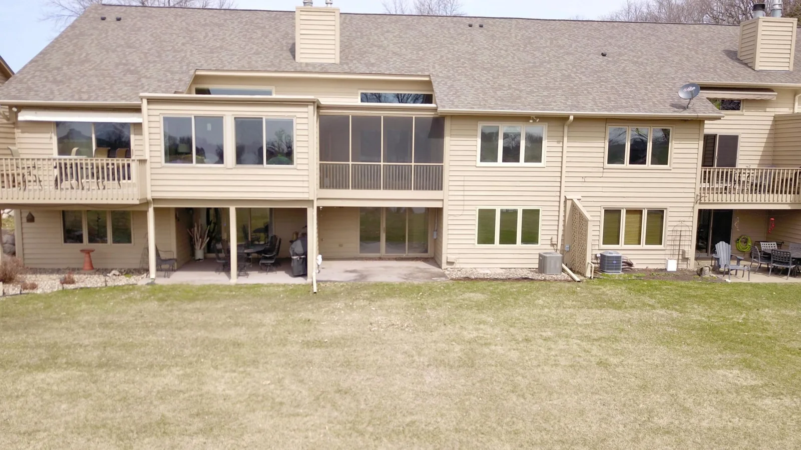 Screened-in porch on back of home