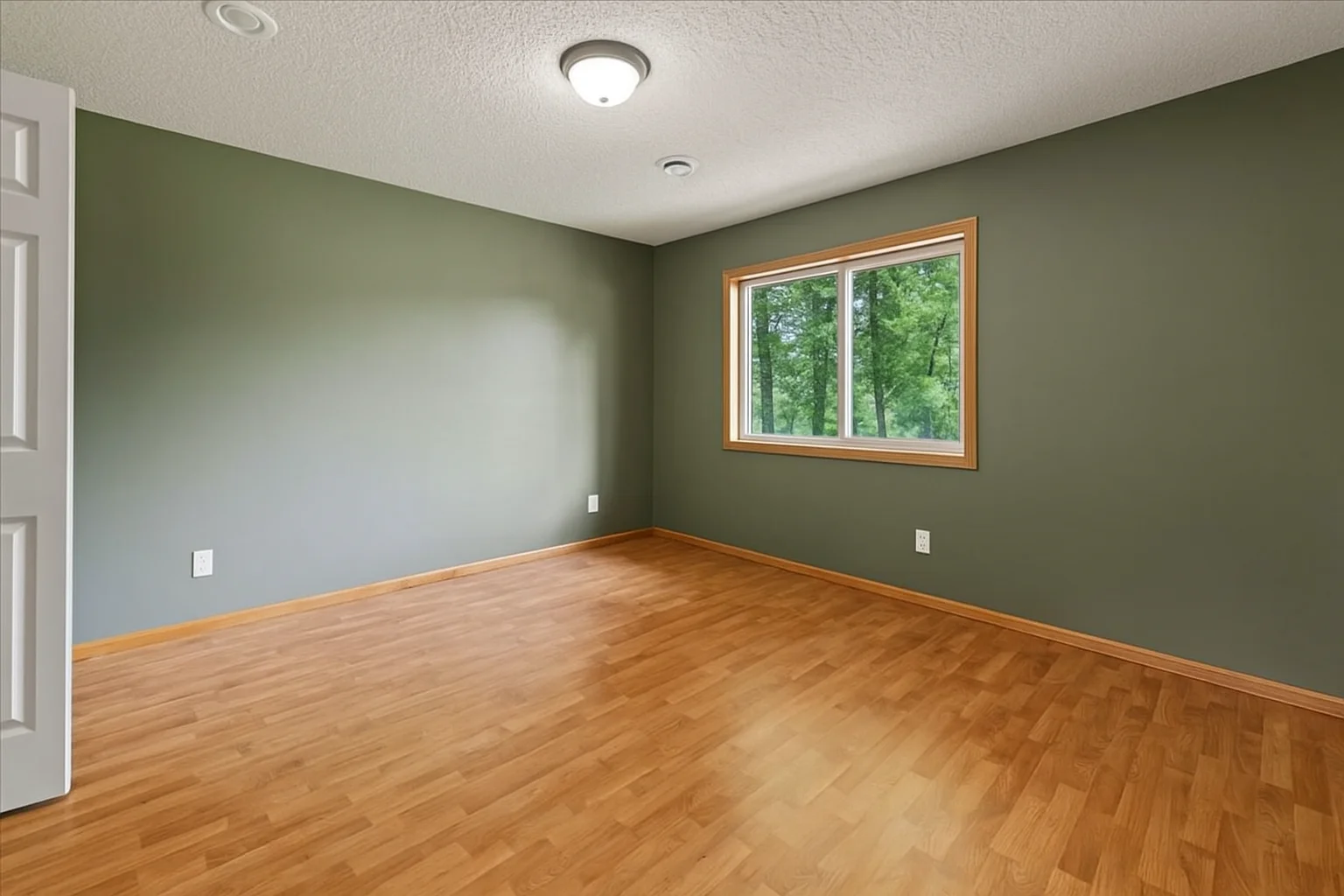 Yes! Another bedroom with beautiful flooring and updated colors!.png