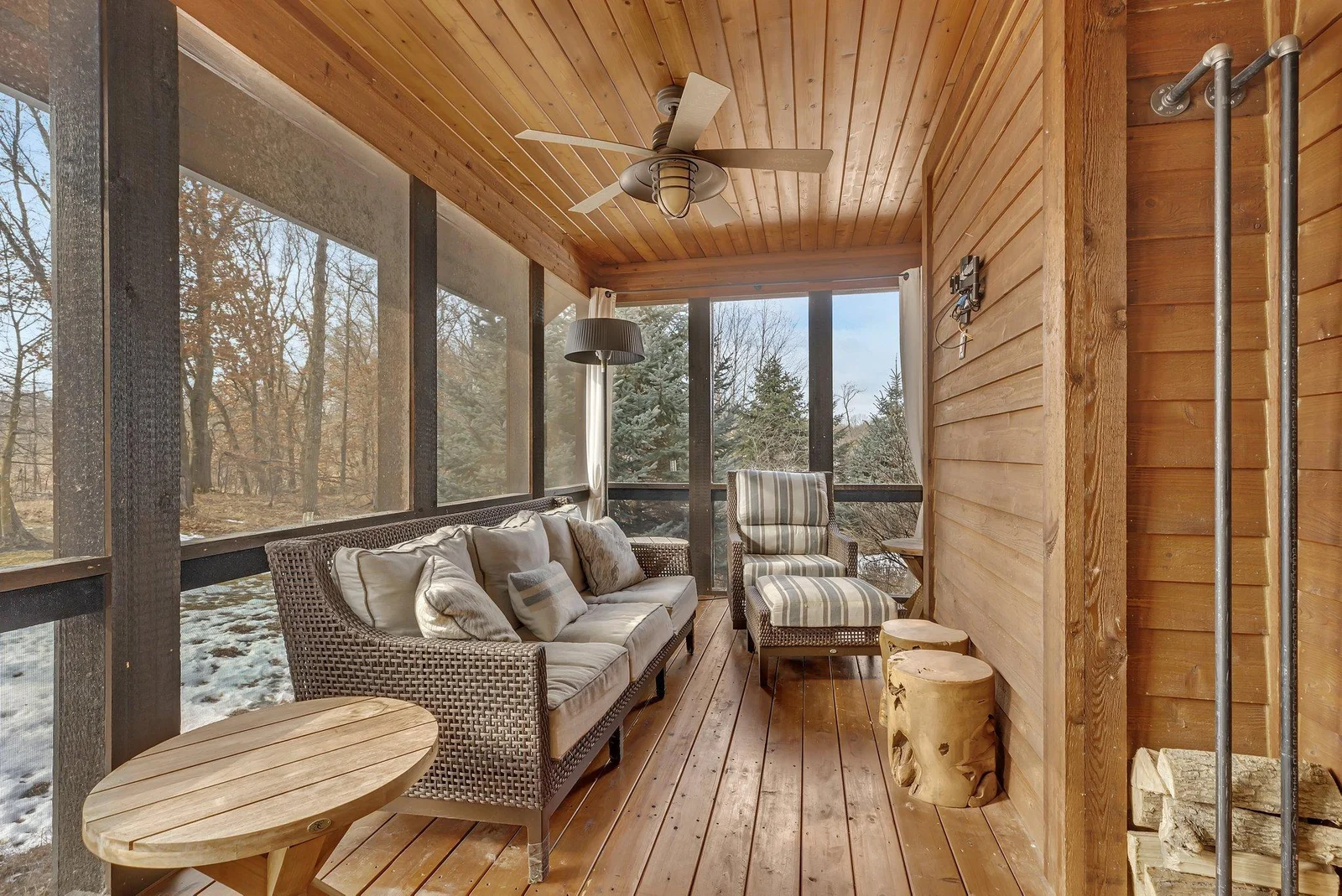 primary bedroom walks out to screened-in porch