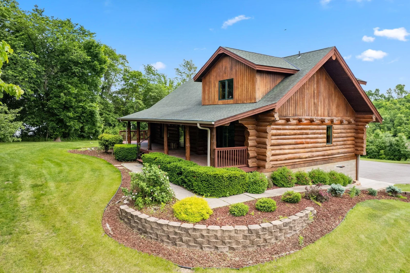 Welcome home to 1867 County Road 35 West, where beauty surrounds this charming log home. Nestled in the picturesque landscape of Lake Berthiaume and serene ponds.  This residence offers a perfect blend of rustic charm and modern comfort.